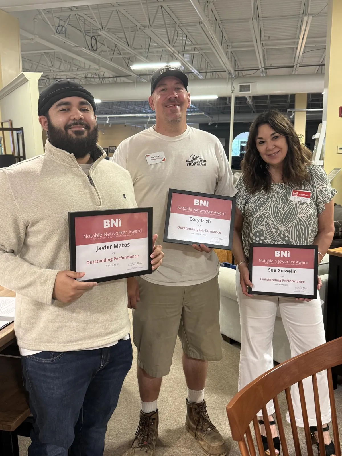 Javier Matos, Cory Irish of Prop Ready and Sue Gosselin holding BNI Notable Networker Award certificates.